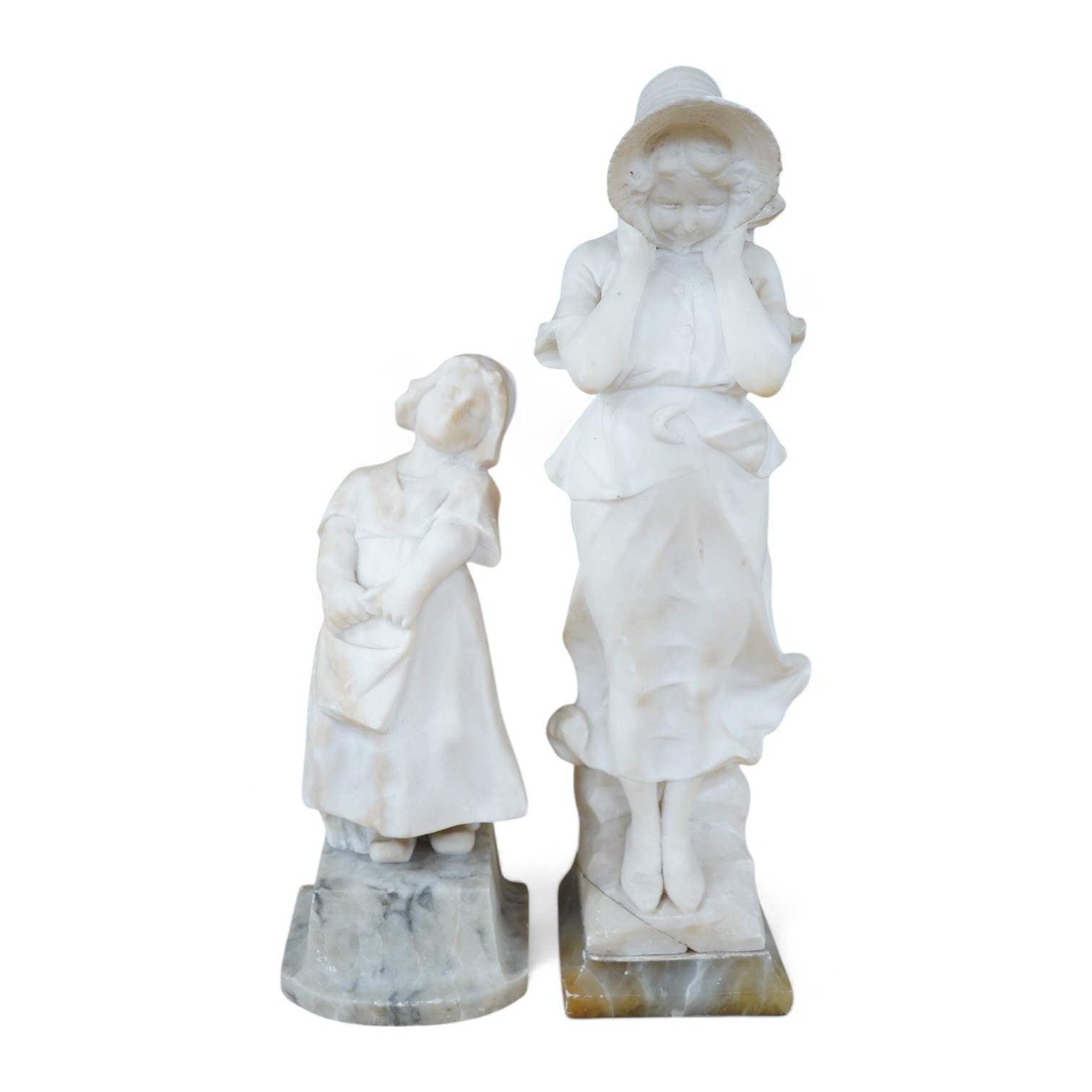 Two 20th century carved alabaster figures of young girls, one of a Dutch girl, the other larger, of a girl in a straw hat, 46cm high. Condition - Dutch girl good, girl with straw hat base broken to one corner